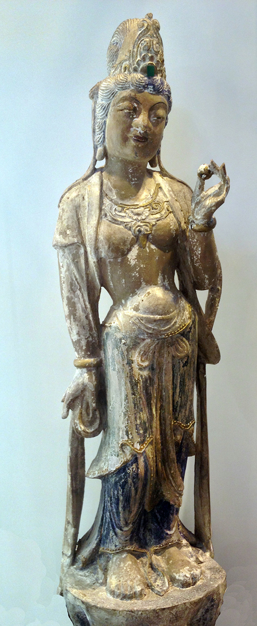 A Guanyin female figure in wood and gesso that sold for £800 on the stand of A.B. Antico at the Antiques for Everyone Fair in November. Image courtesy Antiques For Everyone Fair.